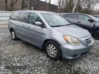 2010 Honda Odyssey EX-L with VIN 5FNRL3H63AB017595, listed as a Copart auction lot 51912695 with 232,457 mi miles and Clean Title. Bid and sale history available at carsss.com. Image 4.