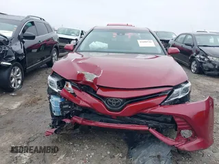 2020 Toyota Camry LE with VIN 4T1C11AK1LU359477, listed as a IAAI auction lot 41800546 with 109,319 mi miles and . Bid and sale history available at DreamBid. Image 6.