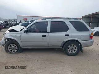 1999 Isuzu Rodeo S with VIN 4S2CK58W4X4358898, listed as a IAAI auction lot 41360738 with 184,948 mi miles and . Bid and sale history available at carsss.com. Image 14.