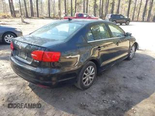 2013 Volkswagen Jetta SE with VIN 3VWDX7AJ5DM375119, listed as a IAAI auction lot 41779752 with 149,943 mi miles and . Bid and sale history available at DreamBid. Image 4.