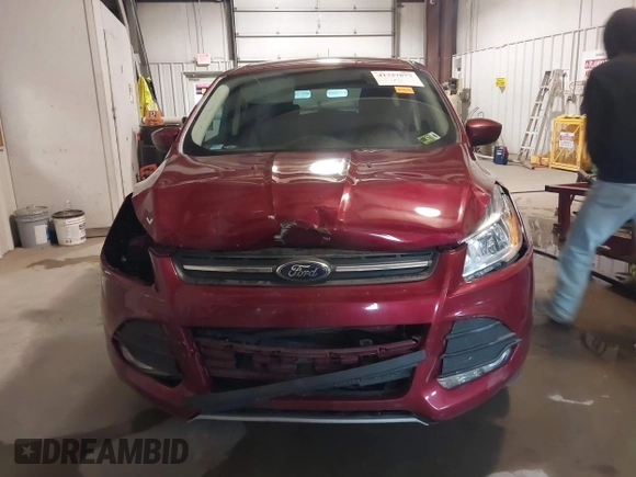 2015 Ford Escape SE with VIN 1FMCU0GXXFUC86876, listed as a IAAI auction lot 41727877 with 114,387 mi miles. Bid and sale history available at carsss.com. Image 13.
