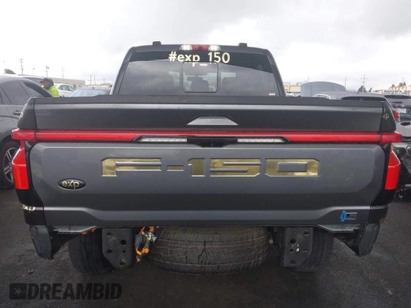 2022 Ford F-150 Lightning Pro z VIN 1FTVW1EL8NWG14070, wystawiony jako IAAI lot #41776980 z przebiegiem 14 812 mil mil oraz . Historia ofert i sprzedaży dostępna na DreamBid. Obrazek 17.