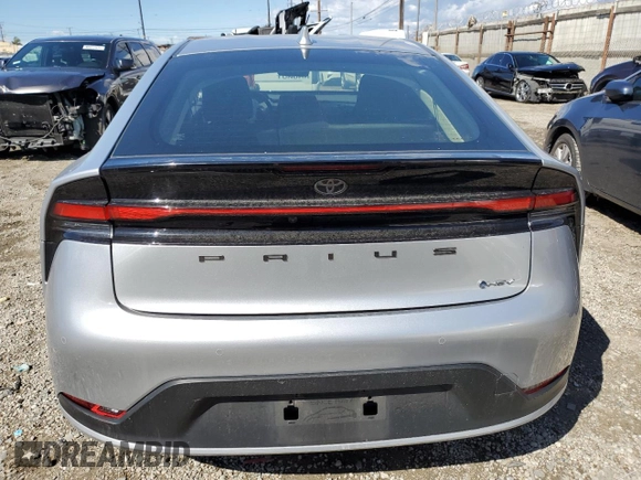 2024 Toyota Prius LE with VIN JTDACAAU4R3018502, listed as a Copart auction lot 56587885 with 22,266 mi miles and Salvage Title. Bid and sale history available at DreamBid. Image 6.