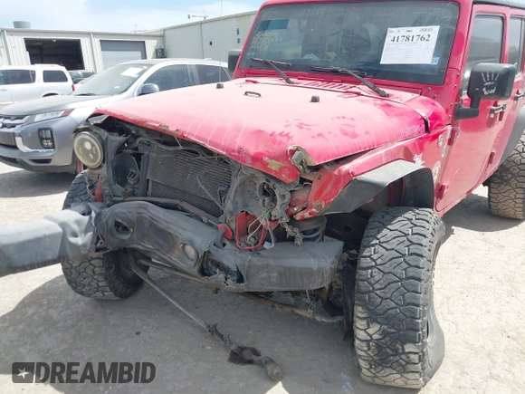 2015 Jeep Wrangler Unlimited Willys Wheeler with VIN 1C4BJWDG9FL750505, listed as a IAAI auction lot 41781762 with 139,000 mi miles and . Bid and sale history available at DreamBid. Image 6.