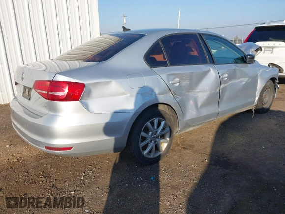 2015 Volkswagen Jetta SE z VIN 3VWD17AJ6FM257858, wystawiony jako IAAI lot #41007963 z przebiegiem 165 064 mil mil oraz . Historia ofert i sprzedaży dostępna na DreamBid. Obrazek 4.