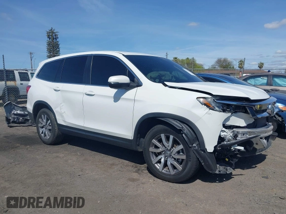 2020 Honda Pilot EX-L with VIN 5FNYF5H59LB027265, listed as a IAAI auction lot 41826300 with 57,201 mi miles. Bid and sale history available at carsss.com. Image 14.