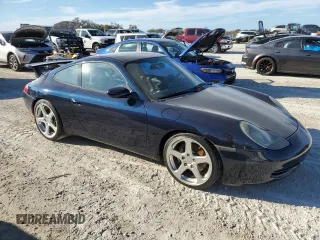 2000 Porsche 911 z VIN WP0AA2996YS621130, wystawiony jako Copart lot #77096434 z przebiegiem Nie podano mil oraz Szkoda całkowita • Salvage title. Historia ofert i sprzedaży dostępna na DreamBid. Obrazek 4.