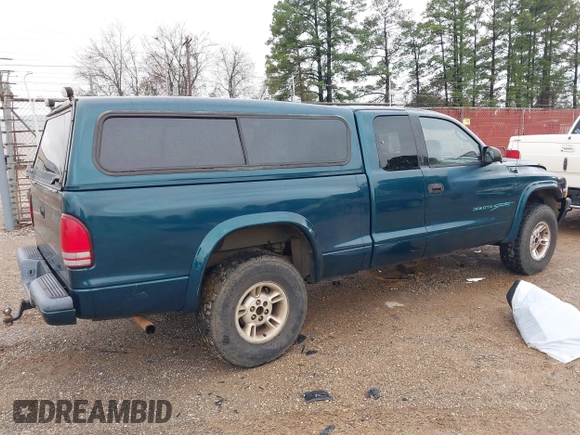 1998 Dodge Dakota SLT with VIN 1B7GG22Y9WS723805, listed as a IAAI auction lot 41289779 with 234,324 mi miles. Bid and sale history available at carsss.com. Image 4.
