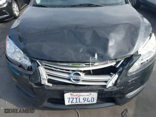 2014 Nissan Sentra SV with VIN 3N1AB7AP7EL697215, listed as a IAAI auction lot 41903464 with 124,977 mi miles. Bid and sale history available at carsss.com. Image 13.