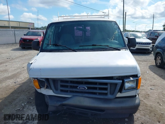 2006 Ford Econoline Cargo with VIN 1FTRE14W66HA95946, listed as a IAAI auction lot 42244992 with 230,184 mi miles and . Bid and sale history available at DreamBid. Image 12.