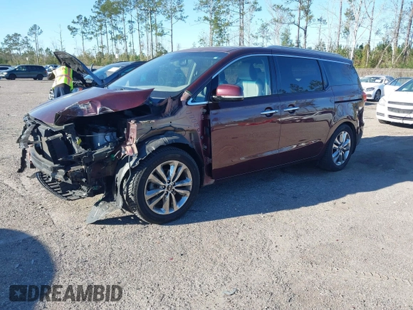 2015 Kia Sedona SX-L with VIN KNDME5C16F6039671, listed as a IAAI auction lot 41736237 with 113,035 mi miles and . Bid and sale history available at DreamBid. Image 2.