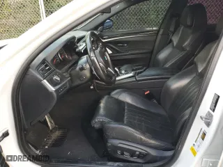 2015 BMW M5 with VIN WBSFV9C5XFD595229, listed as a Copart auction lot 63020514 with 0 mi miles and Salvage Title. Bid and sale history available at carsss.com. Image 7.
