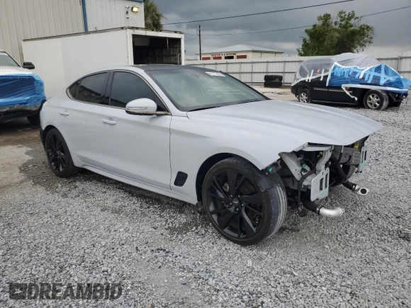 2023 Genesis G70 2.0T with VIN KMTG34TA3PU114905, listed as a Copart auction lot 61777435 with 26,493 mi miles and Salvage title. Bid and sale history available at DreamBid. Image 4.