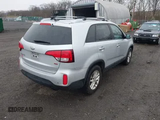 2015 Kia Sorento LX with VIN 5XYKTDA68FG582720, listed as a IAAI auction lot 41872473 with 242,994 mi miles. Bid and sale history available at carsss.com. Image 4.