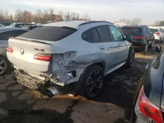2022 BMW X4 M z VIN 5YM23EC05N9L05268, wystawiony jako Copart lot #81892214 z przebiegiem 37 163 mil mil oraz Szkody całkowita. Historia ofert i sprzedaży dostępna na DreamBid. Obrazek 3.