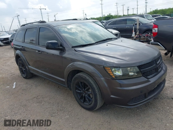 2019 Dodge Journey SE with VIN 3C4PDCBBXKT860142, listed as a IAAI auction lot 42126997 with 101,675 mi miles and . Bid and sale history available at DreamBid. Image 1.