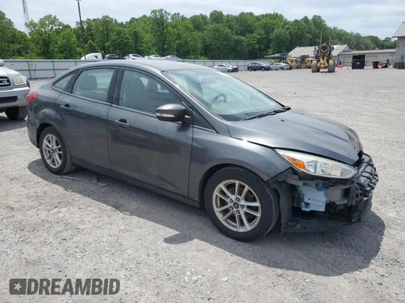 2017 Ford Focus SE with VIN 1FADP3F2XHL201380, listed as a Copart auction lot 56942815 with 136,169 mi miles and Salvage title. Bid and sale history available at DreamBid. Image 4.