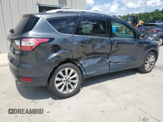 2018 Ford Escape Titanium with VIN 1FMCU0J93JUB20136, listed as a Copart auction lot 56841065 with 129,954 mi miles and Salvage title. Bid and sale history available at DreamBid. Image 3.