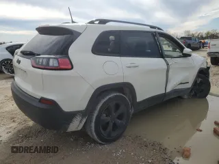 2019 Jeep Cherokee Latitude Plus with VIN 1C4PJLLB7KD338758, listed as a Copart auction lot 46354245 with 106,328 mi miles and Salvage Title. Bid and sale history available at carsss.com. Image 3.