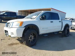 2013 Nissan Titan PRO-4X with VIN 1N6BA0EC6DN305470, listed as a IAAI auction lot 41219072 with 1 mi miles. Bid and sale history available at carsss.com. Image 2.
