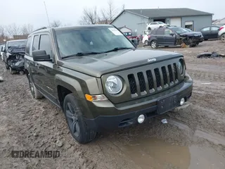 2015 Jeep Patriot High Altitude with VIN 1C4NJPFAXFD342049, listed as a IAAI auction lot 41693119 with 127,259 mi miles and . Bid and sale history available at DreamBid. Image 1.