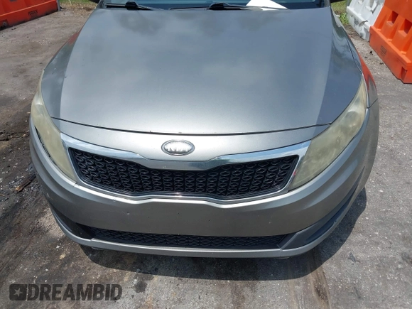 2013 Kia Optima LX with VIN 5XXGM4A77DG161195, listed as a IAAI auction lot 42241468 with 291,814 mi miles and . Bid and sale history available at carsss.com. Image 6.