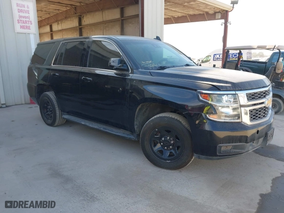 2018 Chevrolet Tahoe Commercial with VIN 1GNSKDEC8JR351269, listed as a IAAI auction lot 41602443 with 79,970 mi miles. Bid and sale history available at carsss.com. Image 1.