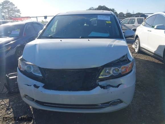 2015 Honda Odyssey Touring Elite with VIN 5FNRL5H90FB001643, listed as a IAAI auction lot 41487890 with NaN miles. Bid and sale history available at carsss.com. Image 12.