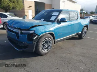 2025 Rivian R1T Adventure z VIN 7FCTGBAA9SN035986, wystawiony jako IAAI lot #41510257 z przebiegiem 2 102 mil mil oraz . Historia ofert i sprzedaży dostępna na DreamBid. Obrazek 23.
