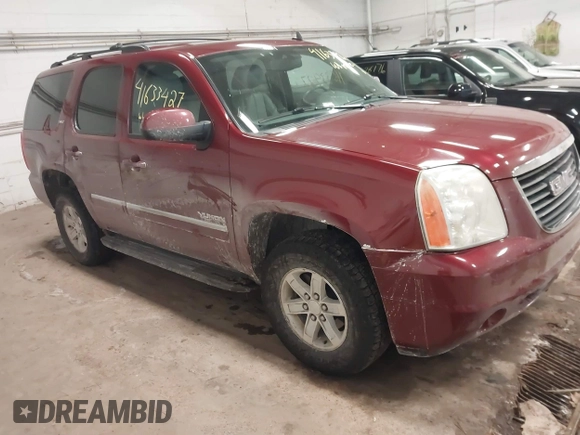 2011 GMC Yukon SLT with VIN 1GKS2CE08BR308792, listed as a IAAI auction lot 41633427 with 216,483 mi miles. Bid and sale history available at carsss.com. Image 1.