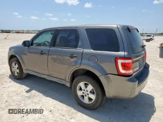 2009 Ford Escape XLS with VIN 1FMCU02739KC12318, listed as a Copart auction lot 61251485 with 179,335 mi miles and Salvage title. Bid and sale history available at DreamBid. Image 2.