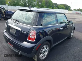 2013 MINI Hardtop with VIN WMWSU3C56DT547099, listed as a IAAI auction lot 42166823 with 138,700 mi miles and . Bid and sale history available at DreamBid. Image 4.