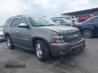 2011 Chevrolet Tahoe LTZ z VIN 1GNSCCE08BR394055, wystawiony jako IAAI lot #42171847 z przebiegiem 112 163 mil mil oraz . Historia ofert i sprzedaży dostępna na DreamBid. Obrazek 1.
