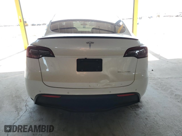 2022 Tesla Model Y Performance z VIN 7SAYGDEF0NF337959, wystawiony jako Copart lot #56871985 z przebiegiem 54 527 mil mil oraz Szkoda całkowita • Salvage title. Historia ofert i sprzedaży dostępna na DreamBid. Obrazek 6.