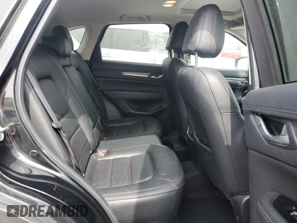 2021 Mazda CX-5 Grand Touring with VIN JM3KFBDM6M0401517, listed as a Copart auction lot 51019645 with 55,906 mi miles and Salvage Title. Bid and sale history available at DreamBid. Image 12.