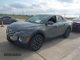 2022 Hyundai Santa Cruz SEL with VIN 5NTJBDAE4NH022823, listed as a IAAI auction lot 42051616 with 23,158 mi miles and . Bid and sale history available at DreamBid. Image 17.