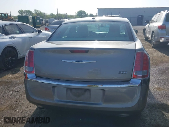 2014 Chrysler 300 with VIN 2C3CCAAG4EH159911, listed as a IAAI auction lot 41963042 with 105,972 mi miles and . Bid and sale history available at DreamBid. Image 16.