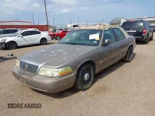 2003 Mercury Grand Marquis GS Convenience with VIN 2MEFM74W93X640458, listed as a IAAI auction lot 42137834 with 159,455 mi miles and . Bid and sale history available at DreamBid. Image 2.