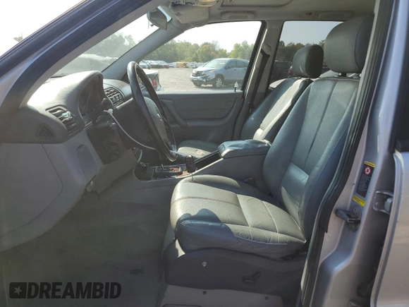2002 Mercedes-Benz M-Class with VIN 4JGAB54E52A337189, listed as a Copart auction lot 71348154 with 220,378 mi miles and Salvage Title. Bid and sale history available at carsss.com. Image 7.