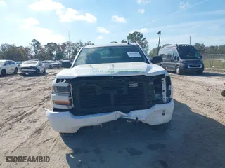 2018 Chevrolet Silverado 1500 Custom with VIN 1GCRCPEC6JZ199689, listed as a IAAI auction lot 41444651 with 136,998 mi miles. Bid and sale history available at carsss.com. Image 6.