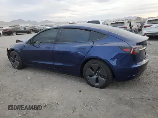 2021 Tesla Model 3 Long Range with VIN 5YJ3E1EB2MF055863, listed as a Copart auction lot 85267844 with 28,141 mi miles and Salvage Title. Bid and sale history available at carsss.com. Image 2.