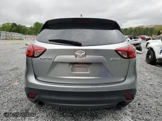 2013 Mazda CX-5 Touring with VIN JM3KE2CE1D0115023, listed as a Copart auction lot 52017905 with 174,254 mi miles and Clean Title. Bid and sale history available at carsss.com. Image 6.