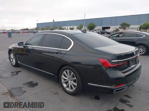 2022 BMW 7 Series 740i with VIN WBA7T2C0XNCJ31291, listed as a IAAI auction lot 40623307 with 98,877 mi miles. Bid and sale history available at carsss.com. Image 3.