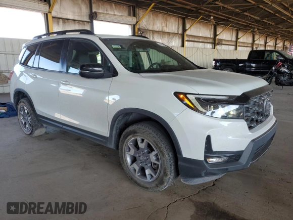 2023 Honda Passport TrailSport z VIN 5FNYF8H68PB000476, wystawiony jako Copart lot #55079045 z przebiegiem 30 543 mil mil oraz Szkoda całkowita • Salvage title. Historia ofert i sprzedaży dostępna na DreamBid. Obrazek 4.