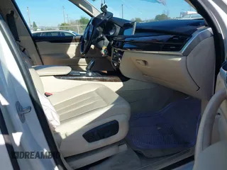 2014 BMW X5 sDrive35i with VIN 5UXKR2C54E0C01376, listed as a IAAI auction lot 41647680 with 50,941 mi miles. Bid and sale history available at carsss.com. Image 5.