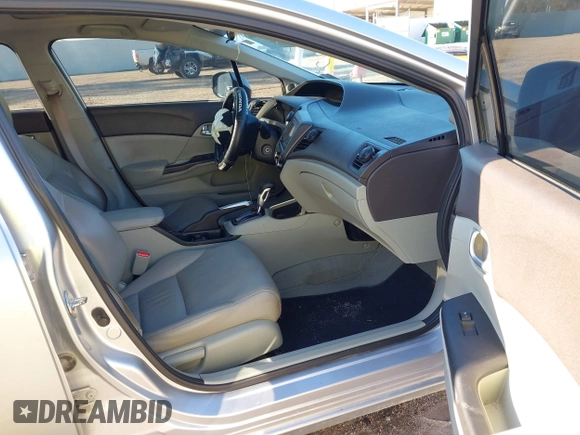 2012 Honda Civic EX-L with VIN 19XFB2F99CE047996, listed as a IAAI auction lot 41596688 with 124,523 mi miles and . Bid and sale history available at DreamBid. Image 5.
