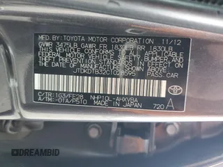 2012 Toyota Prius c One with VIN JTDKDTB32C1028595, listed as a Copart auction lot 53305535 with Not Provided miles and Salvage Title. Bid and sale history available at carsss.com. Image 12.