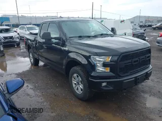 2015 Ford F-150 XLT with VIN 1FTEX1E86FFD05112, listed as a IAAI auction lot 41958169 with 129,426 mi miles. Bid and sale history available at carsss.com. Image 1.