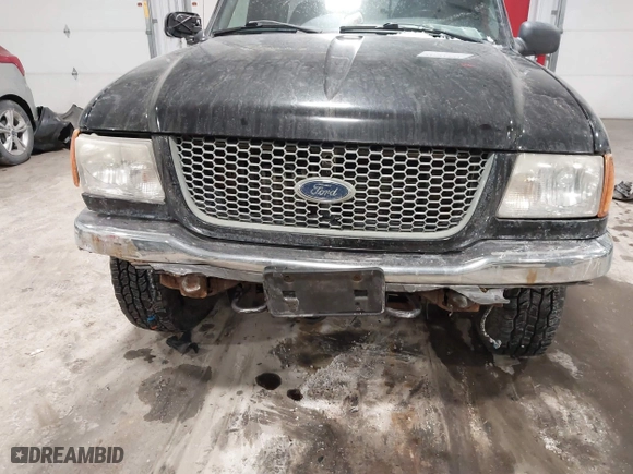 2003 Ford Ranger XL Fleet with VIN 1FTZR45EX3PA60520, listed as a IAAI auction lot 41591797 with 205,040 mi miles. Bid and sale history available at carsss.com. Image 6.