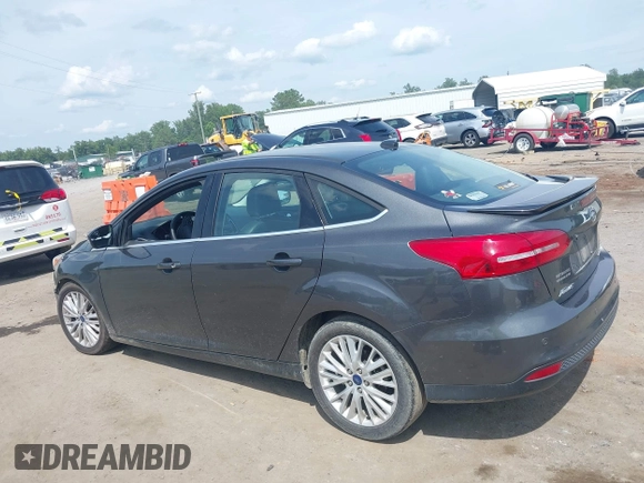 2017 Ford Focus Titanium with VIN 1FADP3J27HL306546, listed as a IAAI auction lot 42480576 with 114,285 mi miles and . Bid and sale history available at DreamBid. Image 15.